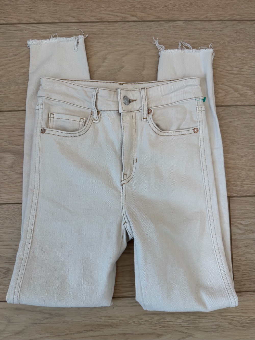 We The Free Cream Skinny Jeans with Raw Hem